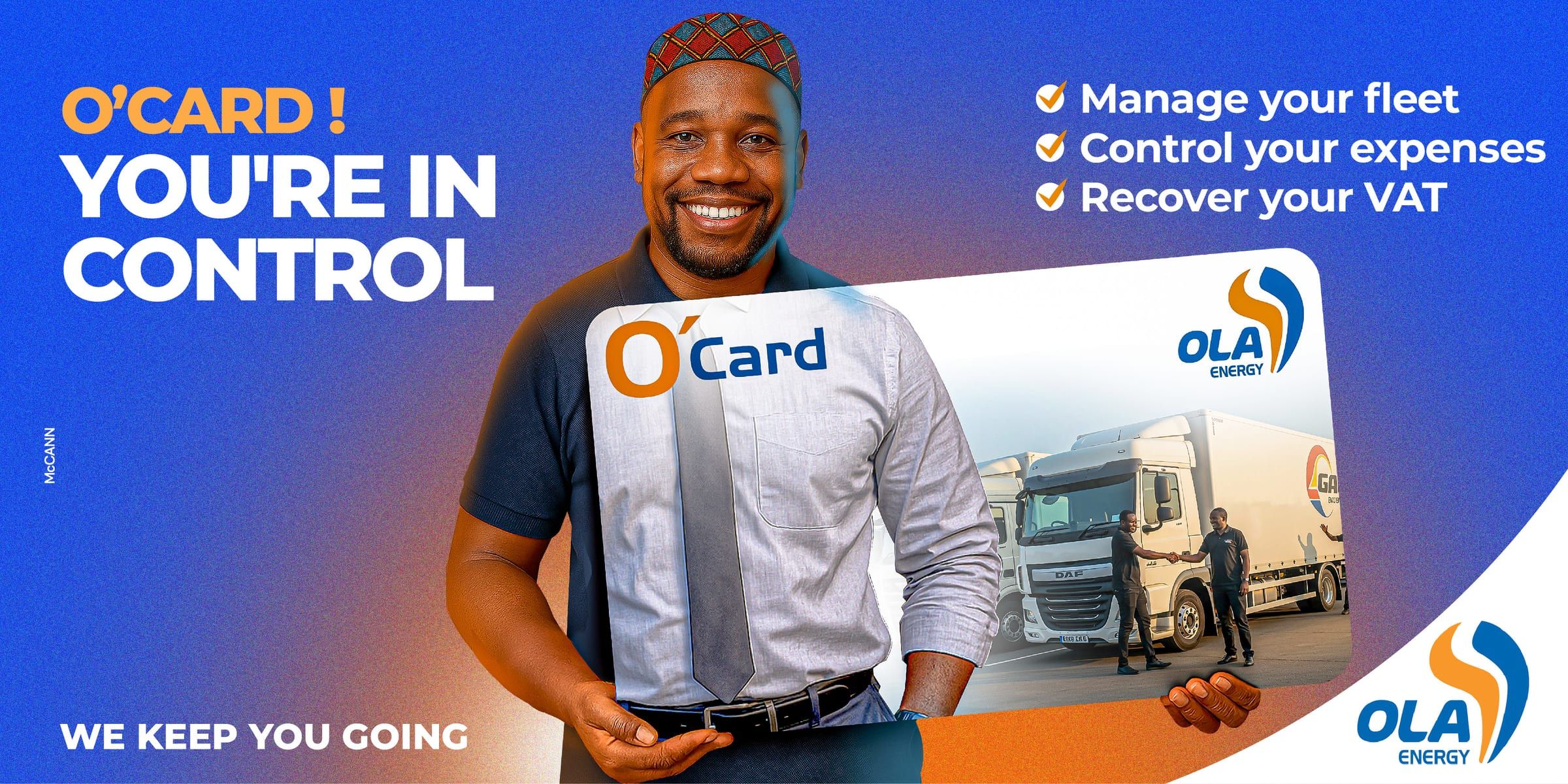Affiche en anglais « O'Card! You're in control » : un homme présente une carte O'Card géante illustrée d'un camion de livraison.