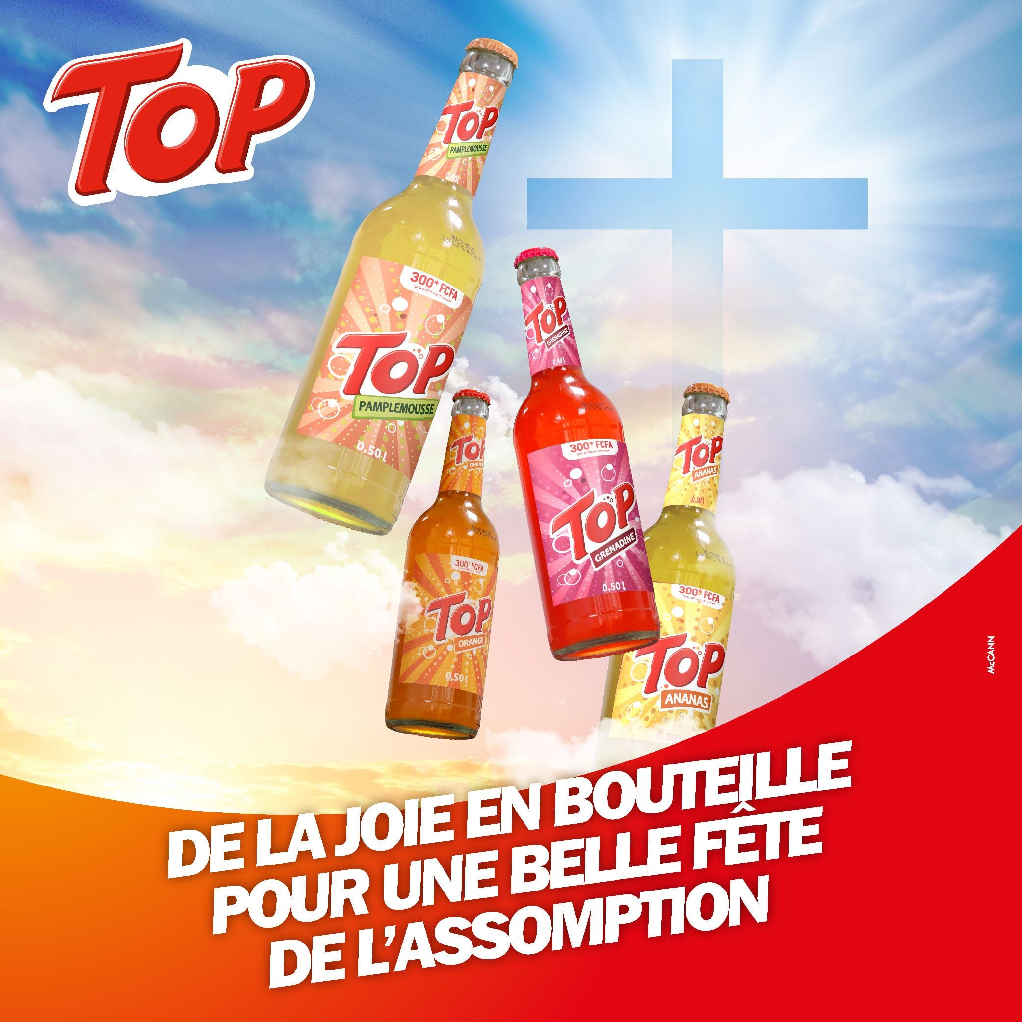 Visuel « De la joie en bouteille pour une belle fête de l'Assomption » : quatre bouteilles de Top flottent dans un ciel lumineux marqué d'une croix.